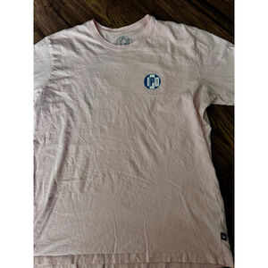 IPD Super Soft Tee in Light Pale Pink with Blue Large Center Logo on Back